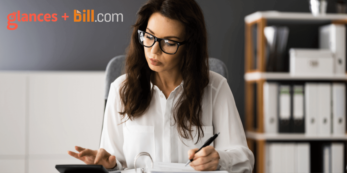Pull up Bill.com Invoices for any customer Woman adding up numbers using a calculator