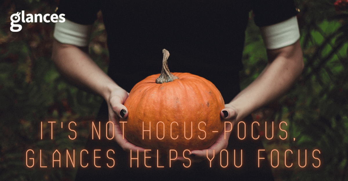 It is not hocus-pocus. Glances helps you focus. Person holding a pumpkin