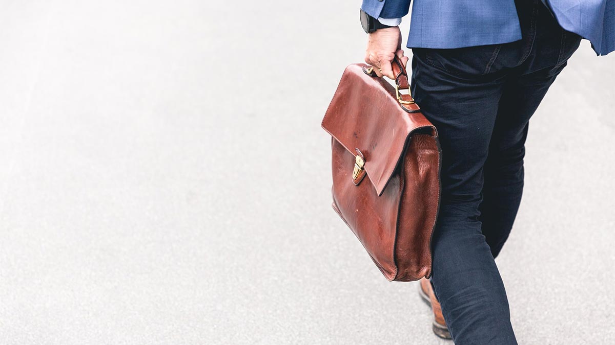 Person carrying a briefcase